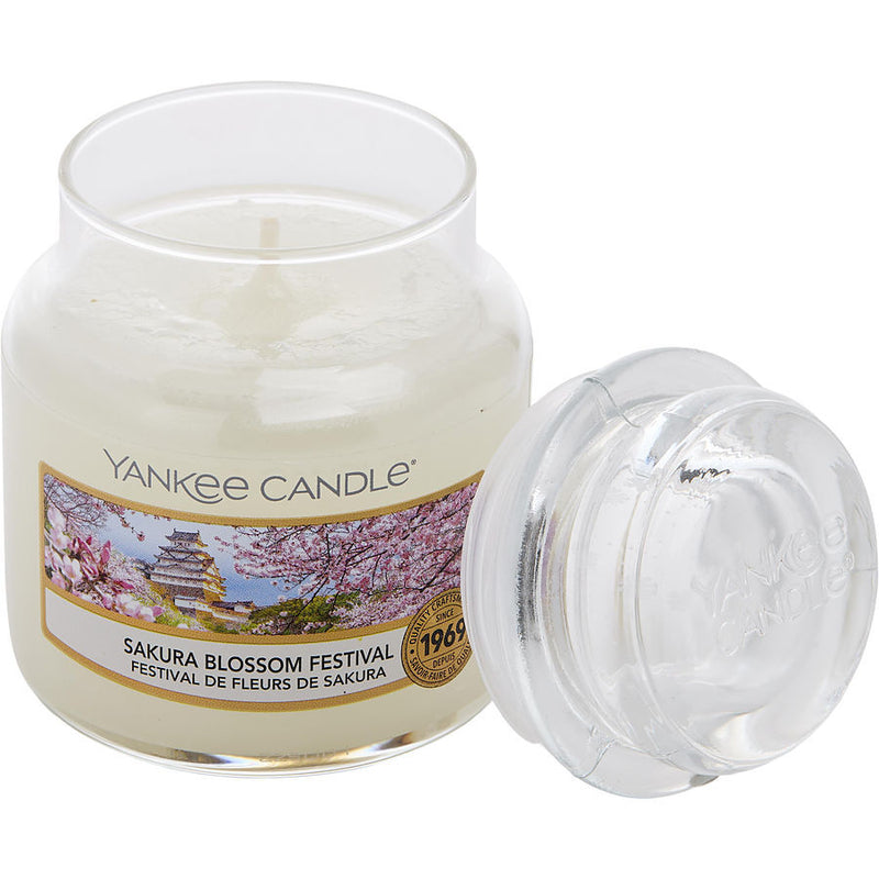 YANKEE CANDLE by Yankee Candle (UNISEX) - SAKURA BLOSSOM FESTIVAL SCENTED SMALL JAR 3.6 OZ